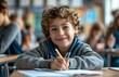 © yevgeniya131988 - A cheerful young boy at his desk in class, writing with a pencil, while other students work behind him