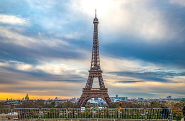 Canvas Print - PARIS, FRANCE - MARCH 30, 2024: Eiffel Tower seen from the Jardins du Trocadero in Paris, France. Eiffel Tower is one of the most iconic landmarks of Paris