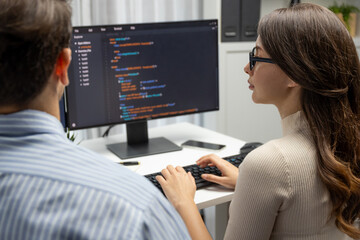 team skilled developers program coding discussing creative website planning software project on two 