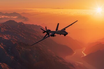 Canvas Print - Aerial view of a plane flying over a mountain range during sunset, with the sky painted in warm colors