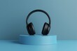 © MNFTs - Stylish black headphones displayed on a blue platform against a minimalist background, ideal for tech and music themes.