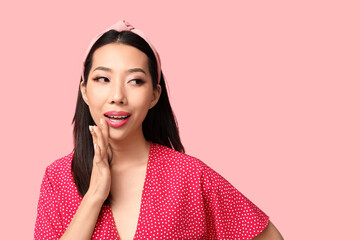 Sticker - Beautiful Asian woman with stylish makeup on pink background