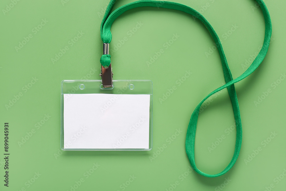 Blank badge with lanyard on green background