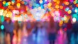 © tashechka - Vibrant and colorful bokeh lights illuminate a night festival, creating a festive and lively atmosphere.