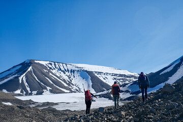 hiking in svalbard glacier in summer time