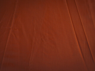 Close-up of old orange umbrella texture for vintage background.    