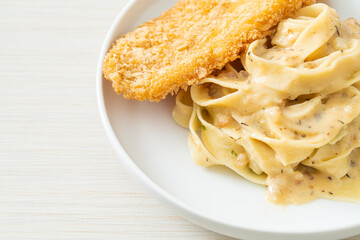 Canvas Print - fettuccine pasta white cream sauce with fried fish