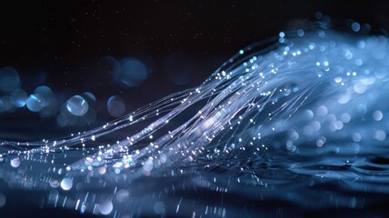 A blue wave with a lot of sparkles in it