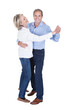 © Andrey Popov - Elderly couple waltzing happily in studio, showcasing active lifestyle