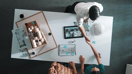 Poster - top view of architect engineer working together and shaking hand cooperative team while making contr