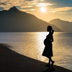 Wall Mural - silhouette of a Young pregnant woman on the beach at sunset