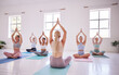 © Alex Shared/peopleimages.com - People, yoga class and instructor in stretching, fitness or wellness for mindful, wellbeing or health. Women, pose and studio for balance, gym and together in activity, training or spiritual practice