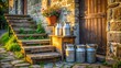 © Wanlop - Early morning rural scene with old fashioned metal milk cans and wooden crates on a worn stone step.