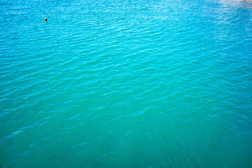 background of blue sea water in sunny weather nature.