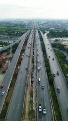 Canvas Print - Aerial mocement view city transport junction cross road with car vehicle transport industry