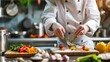 © Teagu - Close-up of a chef in a restaurant kitchen. Highlighting culinary skills and passion. Focusing on food preparation and presentation. Ideal for cooking magazines.