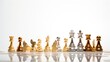© Prapan - Dramatic black and white photograph of chess pieces and gold coins arranged in a dynamic composition, casting long shadows against a textured white wall.