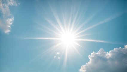 sun's radiance: a bright sun starburst against a vibrant blue sky with fluffy white clouds.