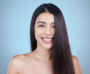 Sticker - Portrait, beauty and happy woman in studio for hair care, growth or texture isolated on blue background. Face, makeup or model with hairstyle at hairdresser salon for glow, skin or keratin treatment