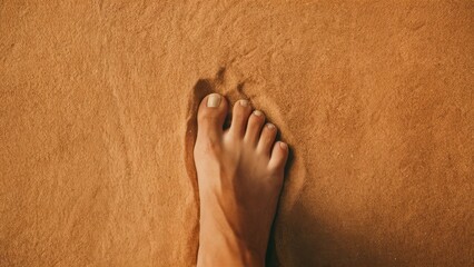 Sticker - A person's foot is in the sand and it looks like a toe, AI