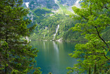 Morskie Oko, or Eye of the Sea. Beautiful mountain lake. View of the Dwoista Siklawa waterfall. Summer landscape in the Tatras