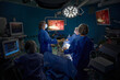 © Svitlana - Team of surgeons doing laparoscopic surgery, looking at monitor