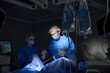 © Svitlana - Surgery doctor operating patient in surgical room using surgical laparoscopy equipment