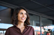 © Stock 4 You - Closeup headshot face portrait of beautiful successful hispanic young business woman looking aside dreaming. Smiling middle age latin female businesswoman, shop customer standing outdoors at building