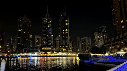 Wall Mural - Evening in Dubai Marina, 4K quality. High quality 4k footage, high rise buildings in the night, city lights