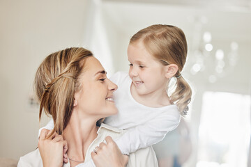 Poster - Smile, girl and woman with hug in home for childhood connection, care and bonding together on weekend. House, family and mom with embrace of daughter in living room for motherhood, happiness and love