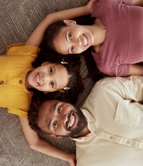 Wall Mural - Above, parents and young girl for bonding, support and childcare with trust, together and happy in comfort. High angle, woman and daughter with man in playful, connection and love as family in home