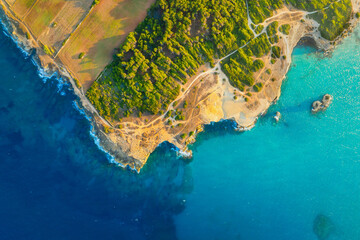 Wall Mural - drone view of the sea coast. rocky shore and sea water. vacation and travel. summer seascape. aerial