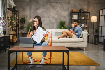 Wall Mural - adult woman have video call meeting on digital tablet show clipboard