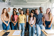 © Xavier Lorenzo - Portrait group of multiracial high school students with senior teacher in classroom. Education and youth community concept