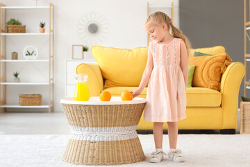 Poster - Cute little girl with oranges and juice at home