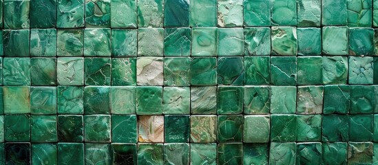 Poster - A mosaic of green tiles creating a textured pattern with copy space image