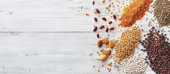 Aufkleber - Various grains legumes and beans scattered on a white wooden surface with copy space image