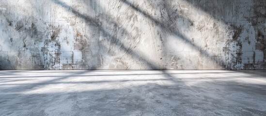 Textured concrete floor makes for an abstract background with ample copy space image for text or objects