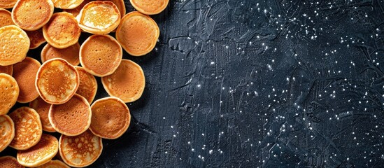 Aufkleber - Top view background of mini pancakes a menu concept for sweet breakfast or dessert with space for text showcasing a healthy organic snack serving size. with copy space image