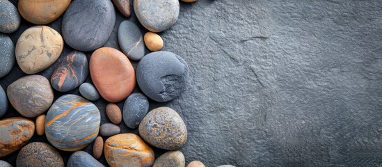 Aufkleber - Background with round pebble stones offers a unique artistic touch in an image with copy space