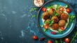 © The 2R Artificiality - Healthy vegan falafel with tahini and hot pepper on blue plate traditional Mediterranean style top down view with space for text
