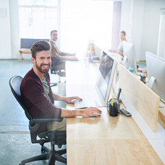 Wall Mural - Portrait, career man and computer with web designer, employee and digital agency in office. Male person, smile and technology in coworking for working, project or deadline with happiness at company