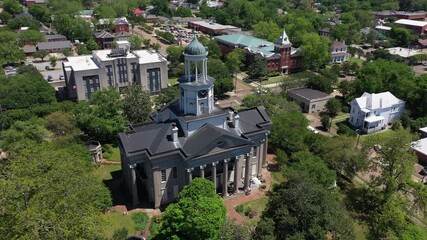 Wall Mural - Vicksburg, Mississippi, USA - April 23, 2024: Afternoon sun shines on the historic downtown Courthouse.