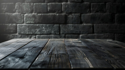 Poster - Old wood table with blurred concrete block wall in dark room background.