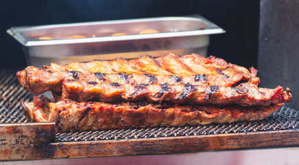 Canvas Print - Barbecue meat is fried on a metal grate