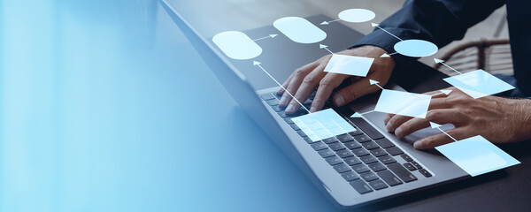 Businessman hands typing on laptop, empty workflow diagram. Copy space
