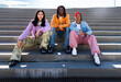© oneinchpunch - Young group of multiethnic hip-hop dancers wearing colorful urban streetwear dancing - Stylish multiracial rap crew portrait in the city