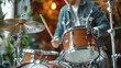 © AS - someone is playing drums close up