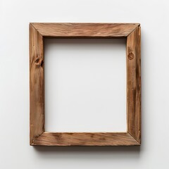 A simple, vintage wooden picture frame stands empty against a clean white background, emphasizing minimalism with its natural textures and straightforward design.