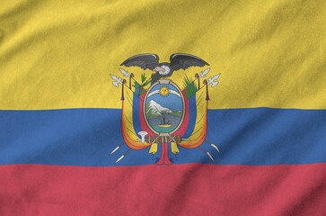 Wall Mural - Ecuador flag depicted on folded wavy fabric of old cloth close up